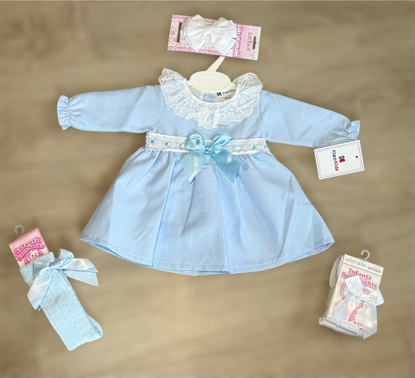 Baby girls blue frill collar bow dress