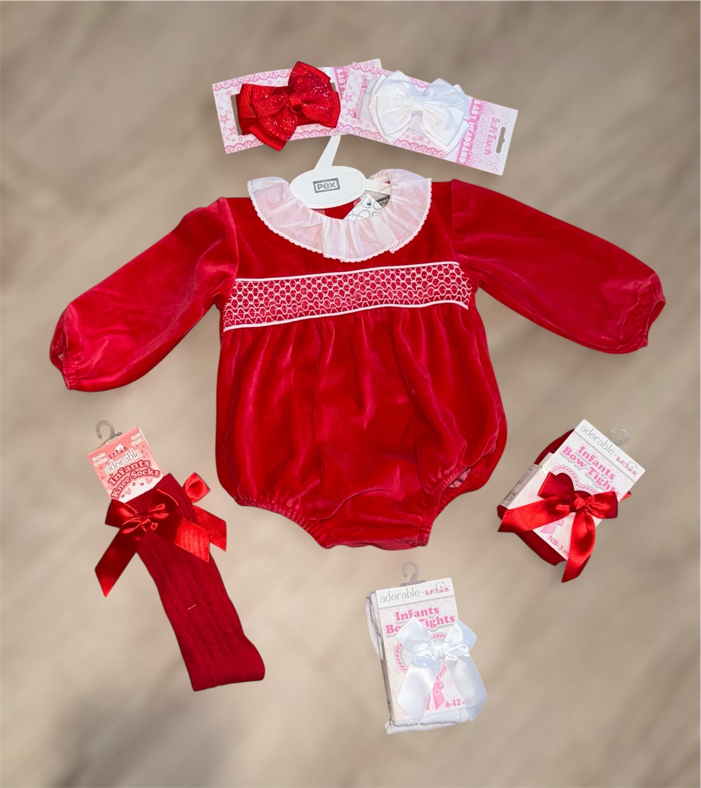 Red velour smocked romper