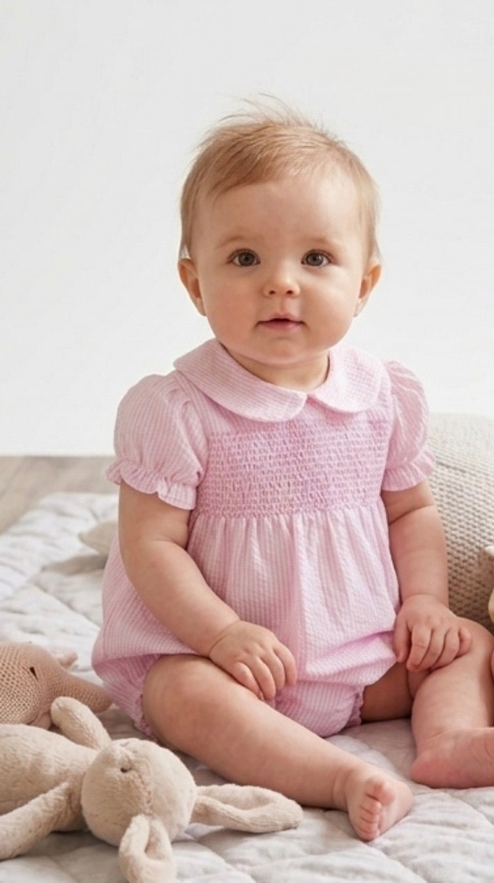 Pink smocked romper