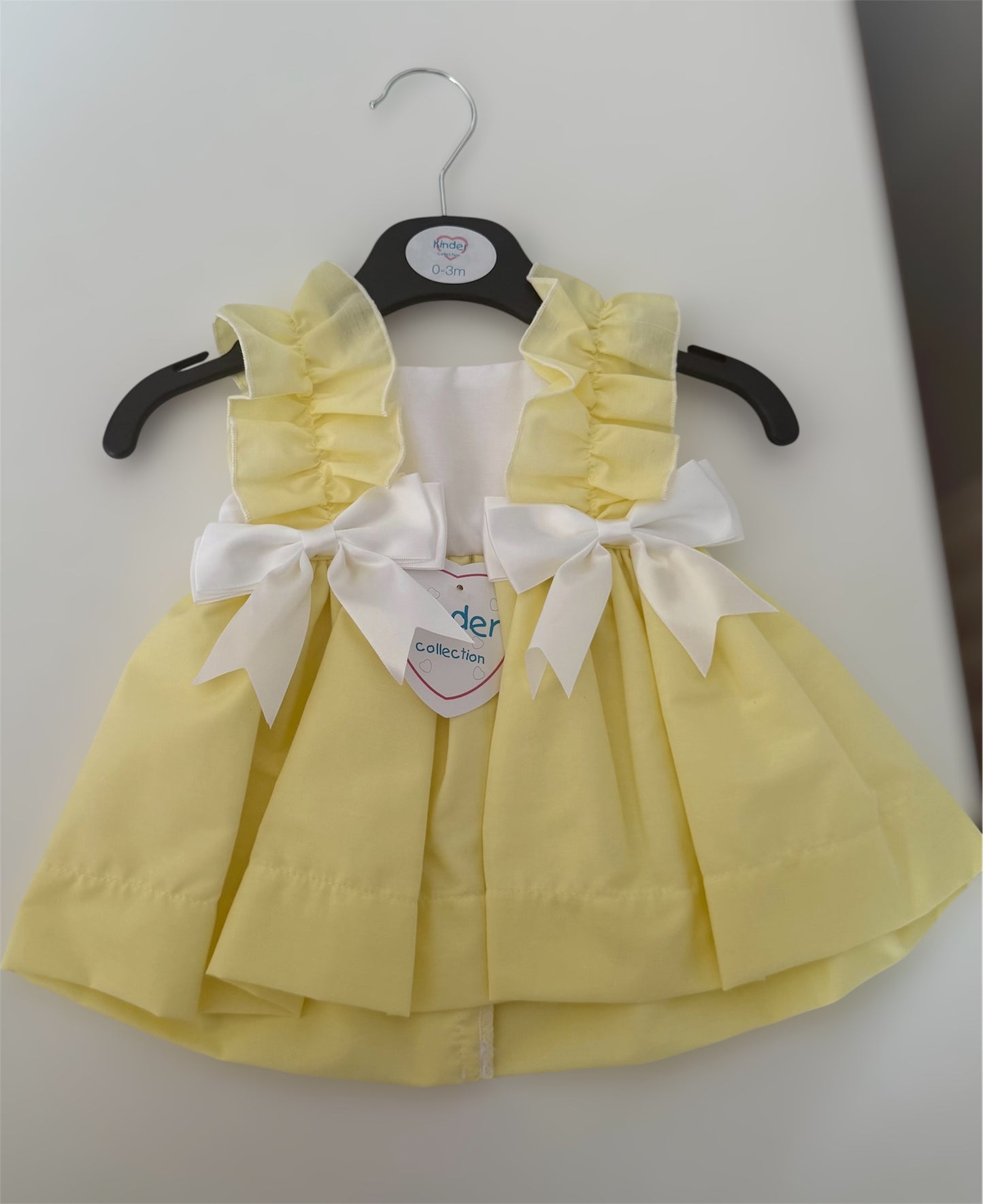 Girls lemon frill dress