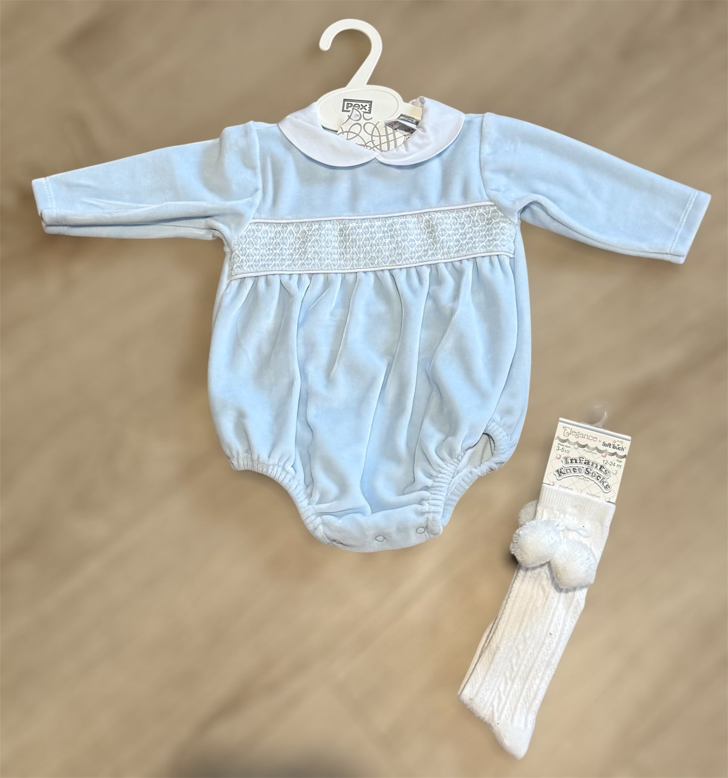 Blue velour smocked romper