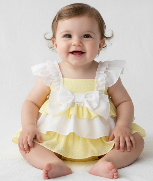 Baby girls lemon and white floaty dress and pants