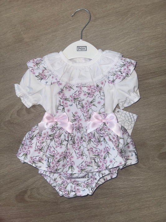 Baby girls pink and lilac bow romper