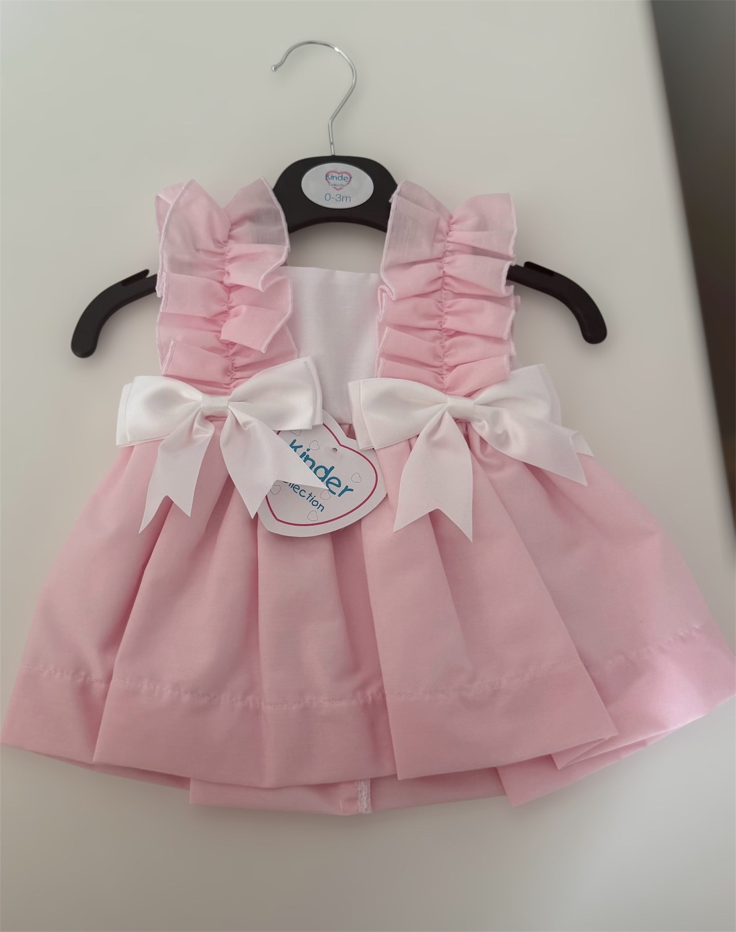 Girls pink frill dress