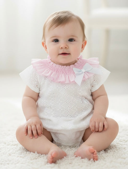 Baby girls white romper with pink smocked collar