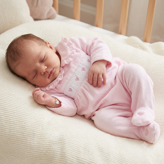 Baby girls pink frill collar heart print smocked slepepsuit